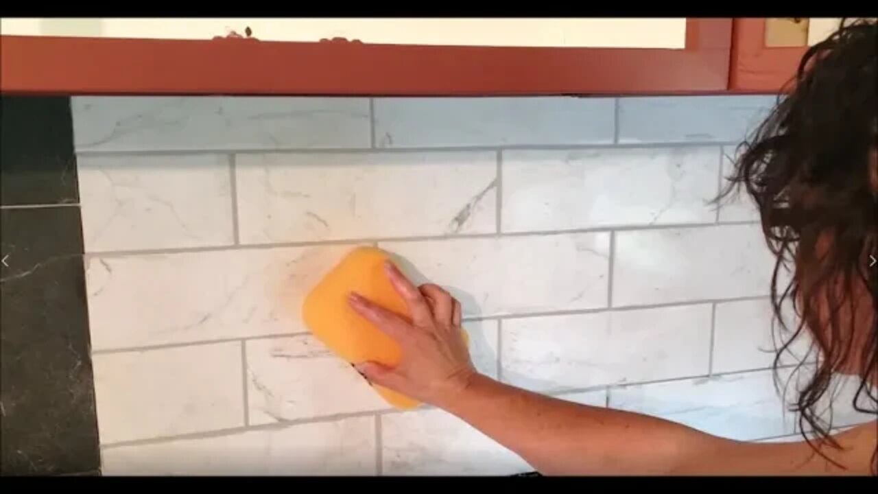 DIY Grouting kitchen tile on the farmhouse property rehab