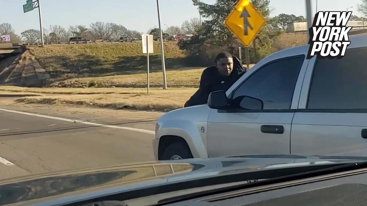 Friday fail! Man clings to SUV hood going 70 mph