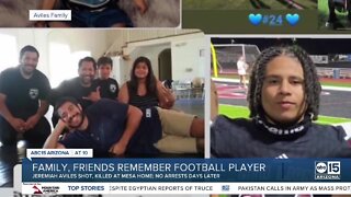 Community gathers to remember killed football player