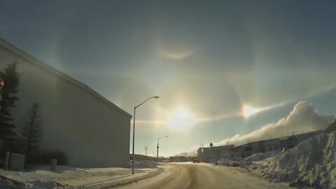 SUN CAUGHT SHINING THROUGH THE FIRMAMENT AND CIRCLING ABOVE EARTH