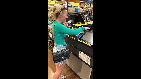 Paying for her groceries with her hand 🤚 at Whole Foods - MOTB Infrastructure.