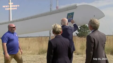 Biden checks the strength of a windmill blade & gets surprised by 'Build Back Better' sticker on it.