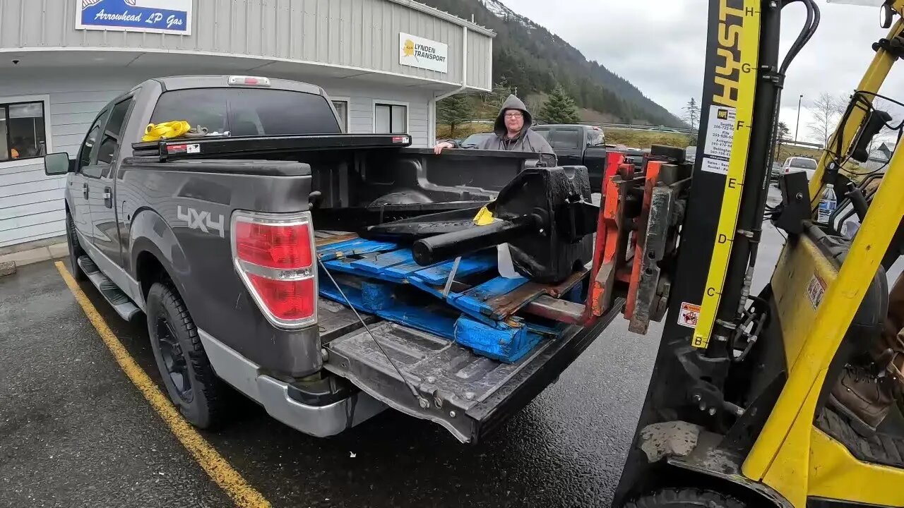 Picking up our 1000 lb mooring anchor and fishing with new friends