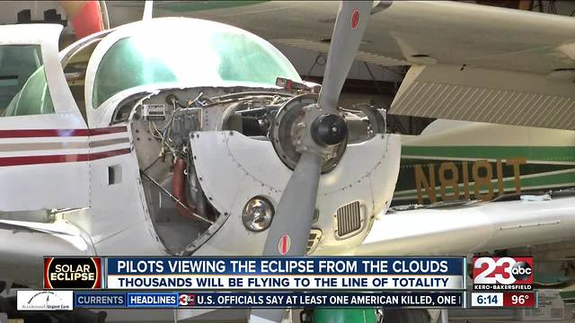 Local pilot flying above clouds to view eclipse