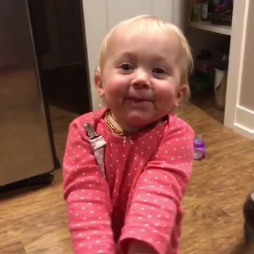 Little Girl Loves Eating Peanut Butter