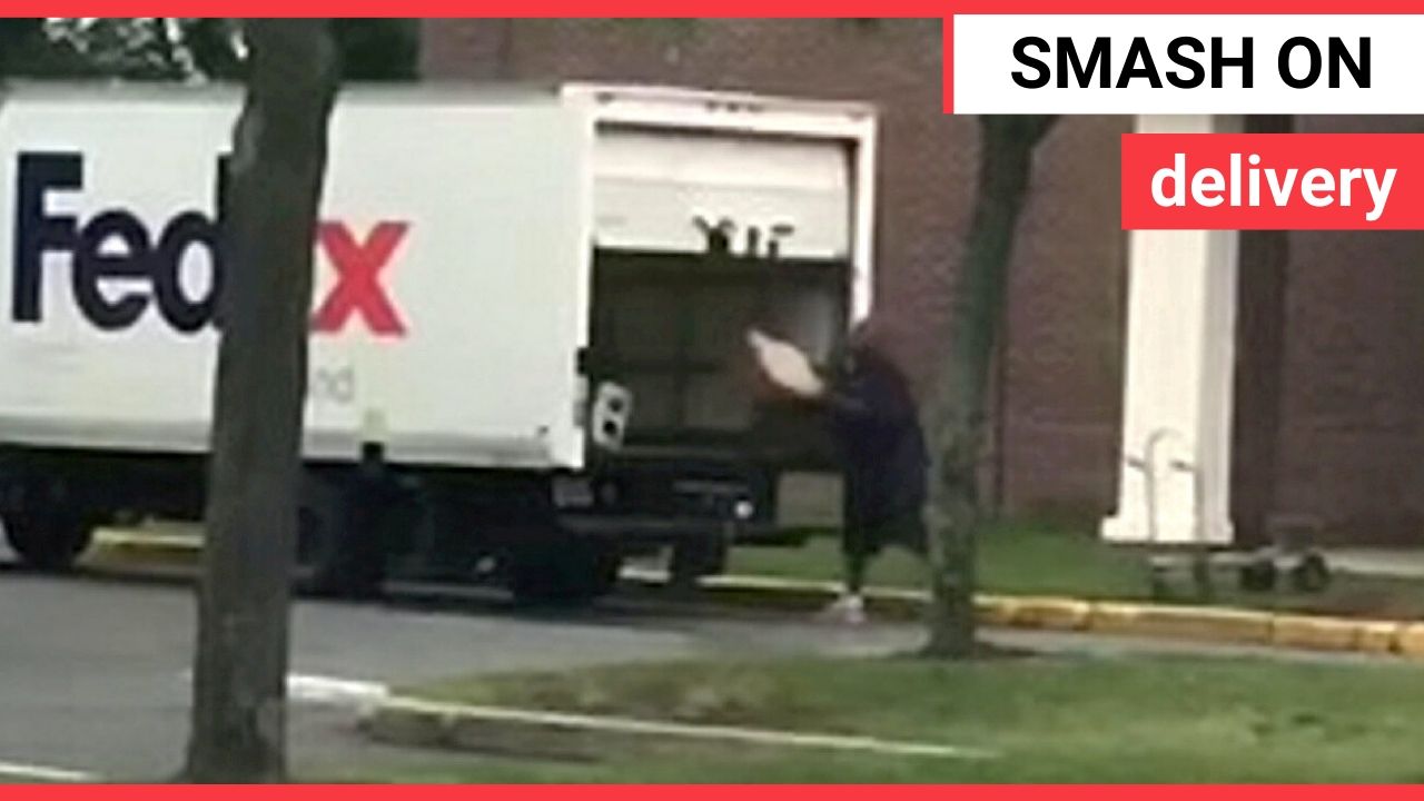 FedEx driver was caught on camera throwing packages into the back of his truck