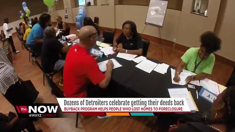 Dozens of Detroiters celebrate getting their deeds back