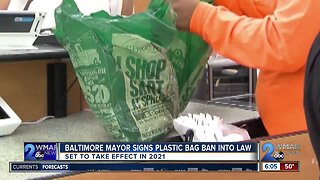 Young signs Baltimore's plastic bag ban into law