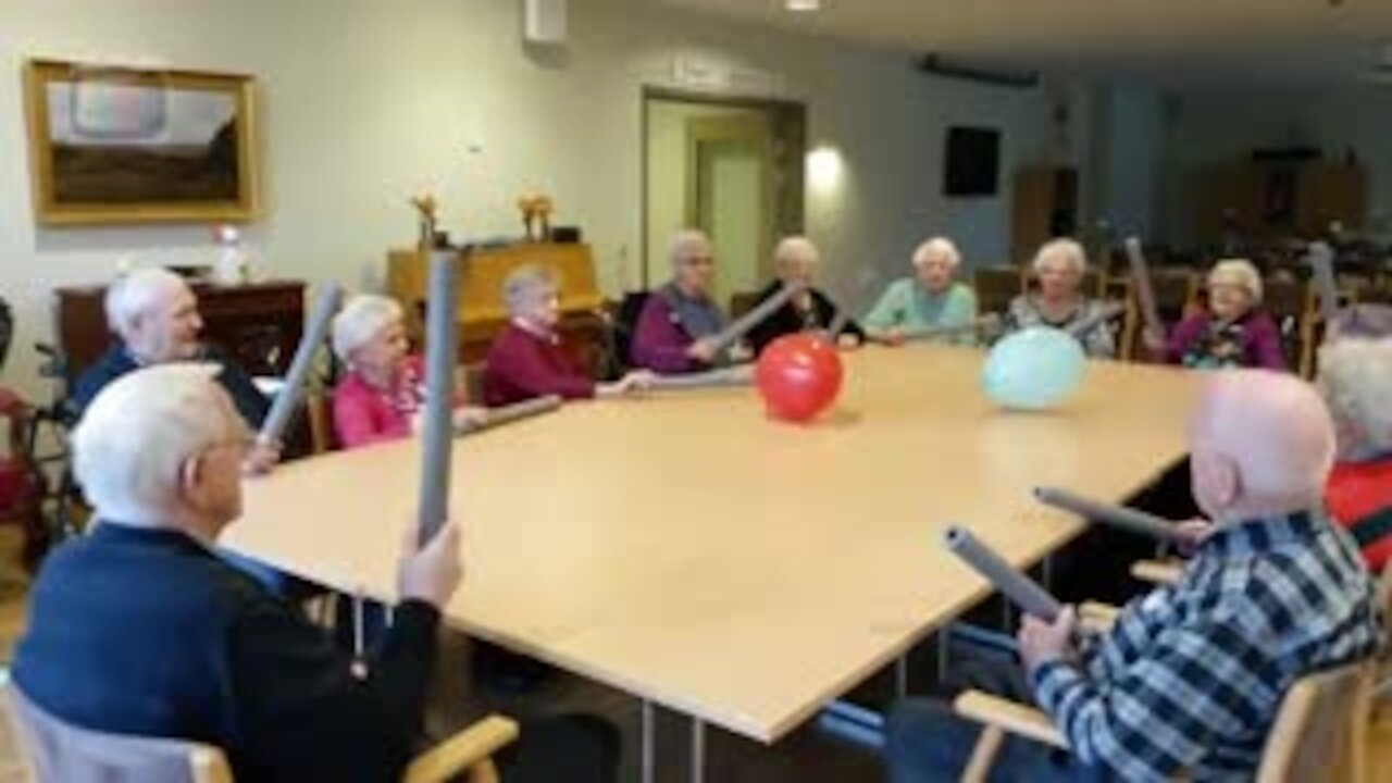 Elderly People Play with Balloons