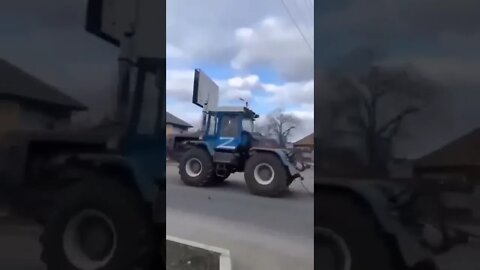 Stones thrown at Russian recovery tractor