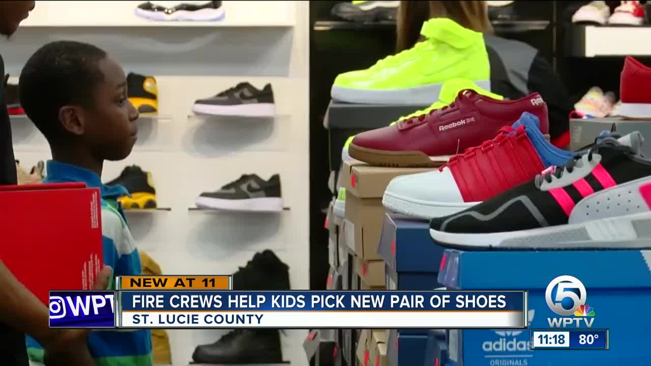 St. Lucie County firefighters help children get new shoes