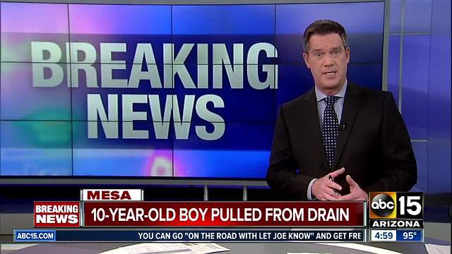 Young boy pulled from storm drain in Mesa