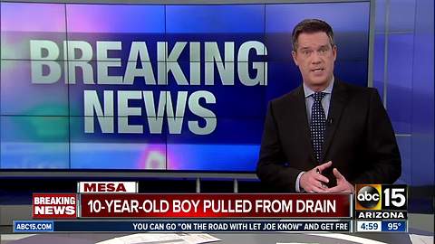 Young boy pulled from storm drain in Mesa
