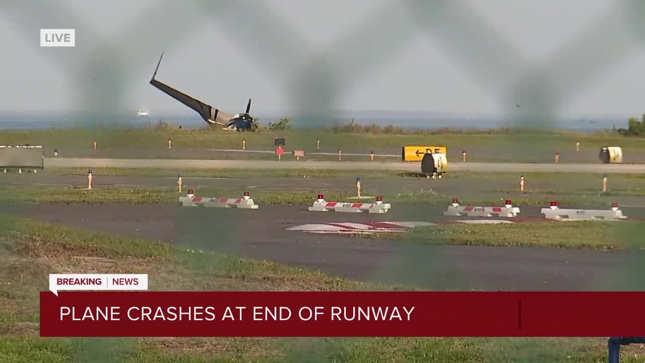 Small plane carrying 3 goes off runway at Albert Whitted Airport, ends up near water