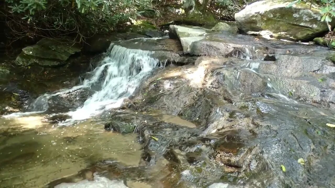 The peaceful sounds of flowing water and waterfalls on the Glen Burney Trail at Blowing Rock, NC.