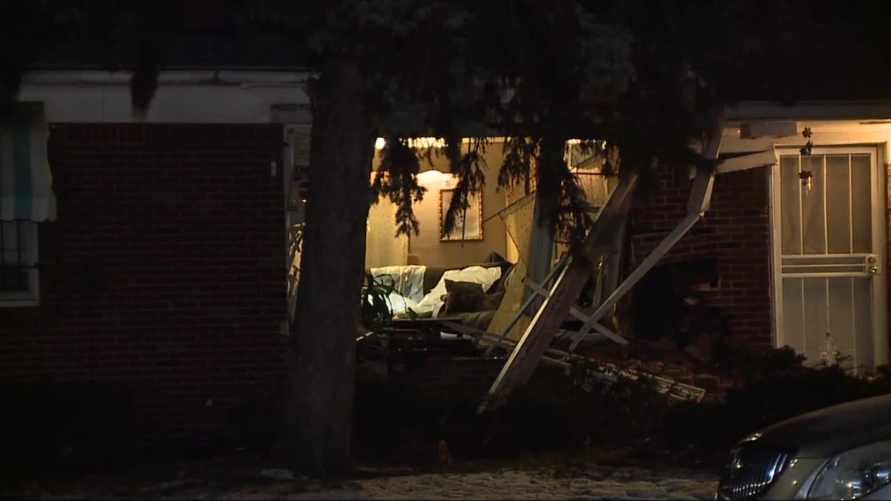 Vehicle slams into home on Detroit's east side