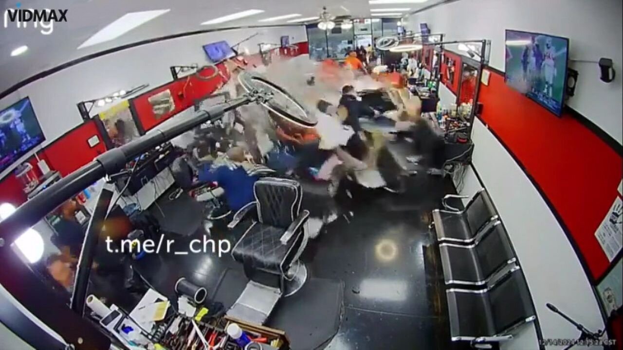 Wild Video Shows An SUV Crash Through A Packed Barbershop