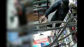 Detectives searching for armed robber who hit two Tampa gas stations