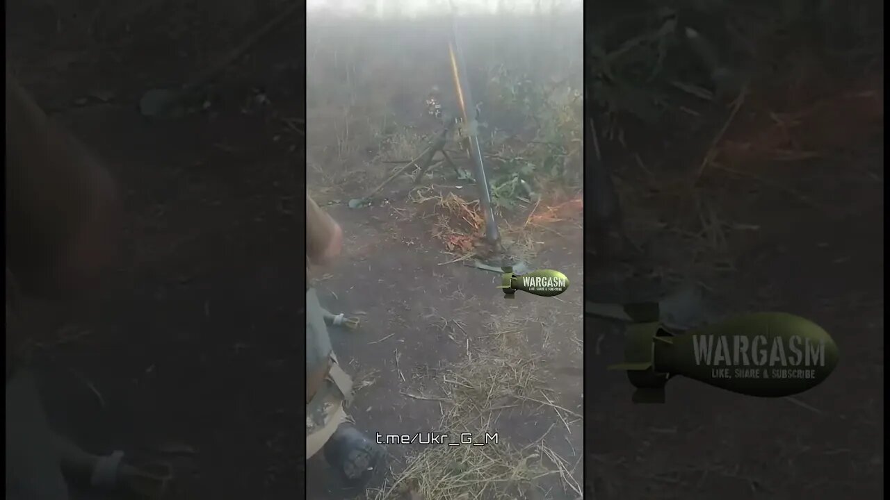 Whacking a mortar tube with a spade
