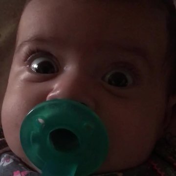 Baby Reacts With Funny Face To Light Turning On And Off