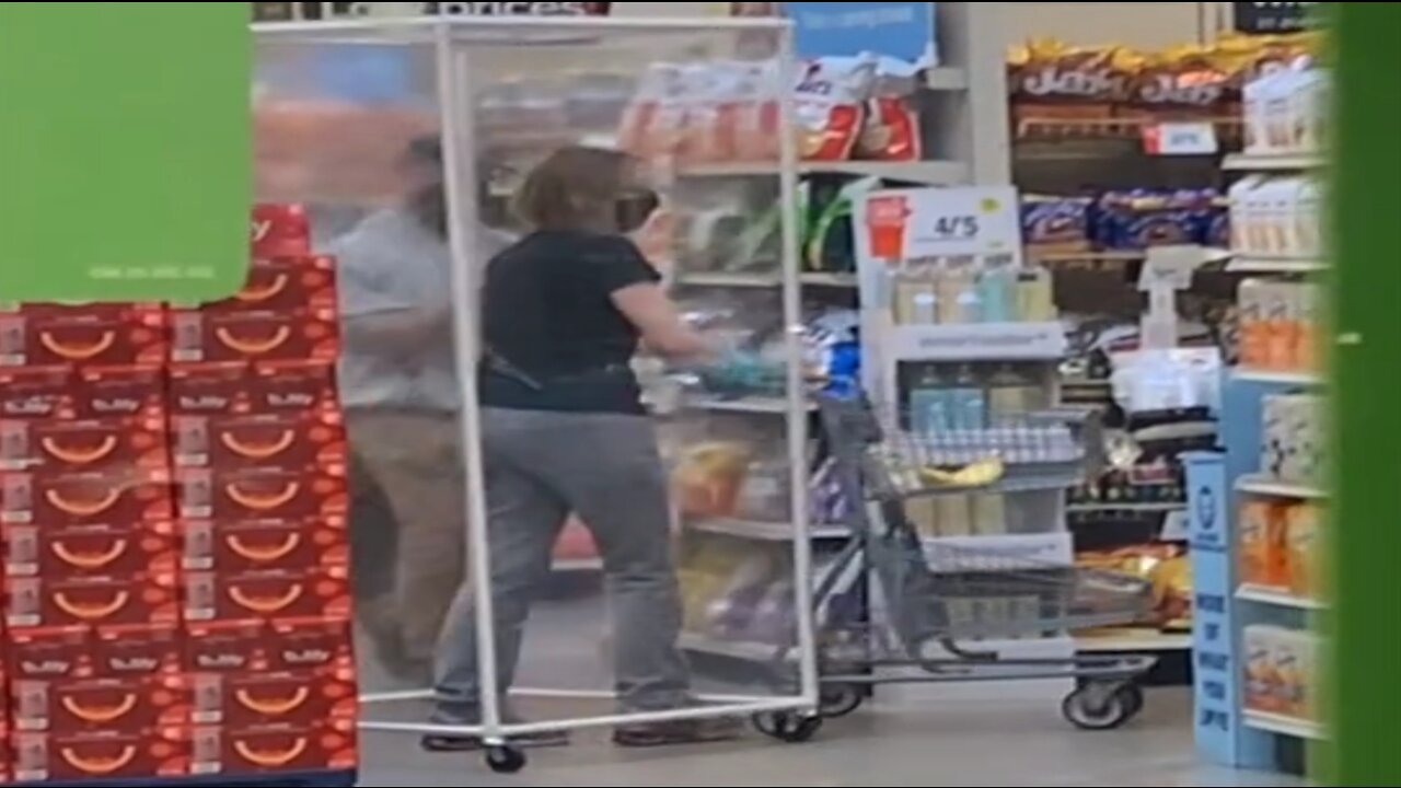 Woman Goes Shopping Inside Plastic Cage In Fear Of Covid