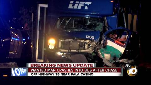 Wanted man crashes into bus after pursuit