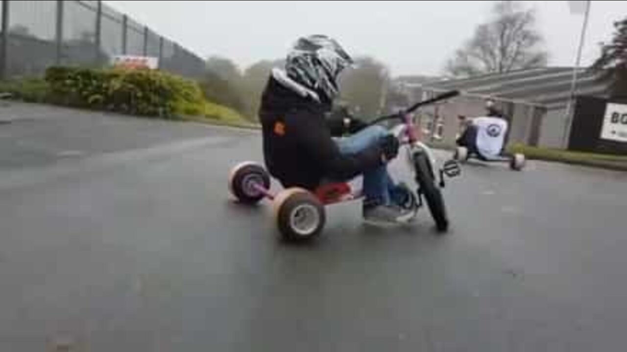 Bunch of youngsters take to English street for extreme downhill drift triking