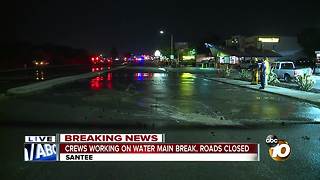 Crews working on water main break, roads closed