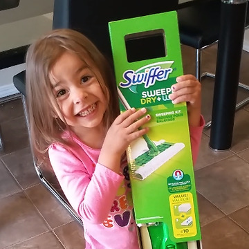 Cute Girl Excited By The Swiffer Cleaner