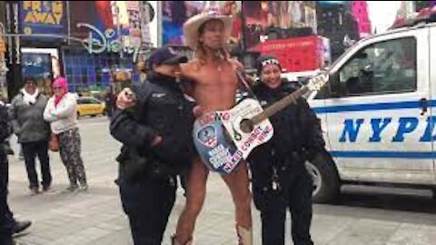 Meeting Robert John Burck, better known as the Naked Cowboy when taking a walk around Time Square.