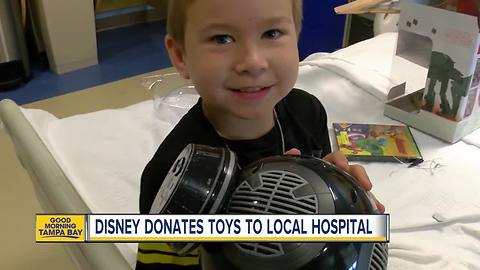 Disney donates 12 boxes of toys to local children’s hospital