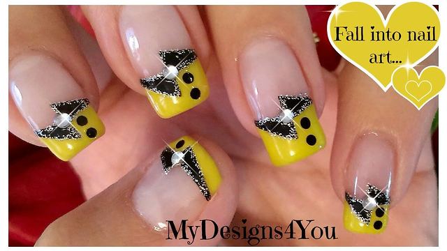 Black and yellow French tip nail art