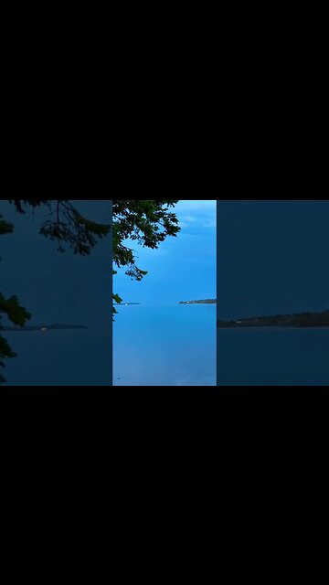 Perfectly Calm Water a reflects the Sky