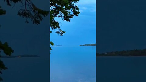 Perfectly Calm Water a reflects the Sky