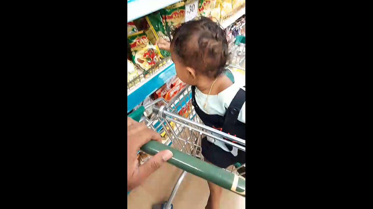 Cute baby vaishu does careful shopping in Chennai