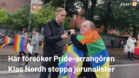 Här försöker Pride-arrangören Klas Nordh stoppa journalister