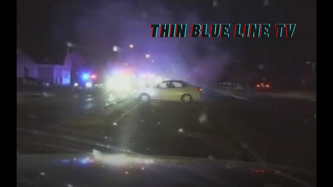 DASHCAM: Suspect Ambushes & Shoots At Officer Sitting In Squad Car, Pursuit Ensues