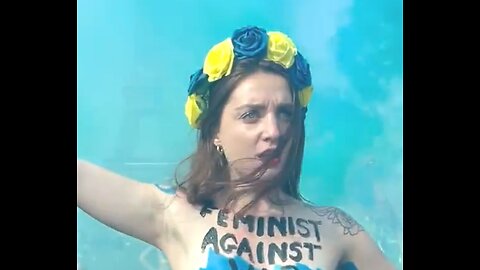 Topless feminists shout Slava Ukraini