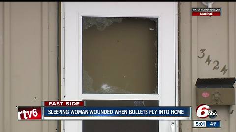 Sleeping woman wounded when bullets fly into home