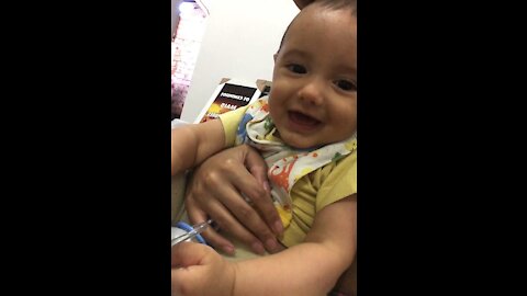 Cute Baby Chatting on Cell Phone