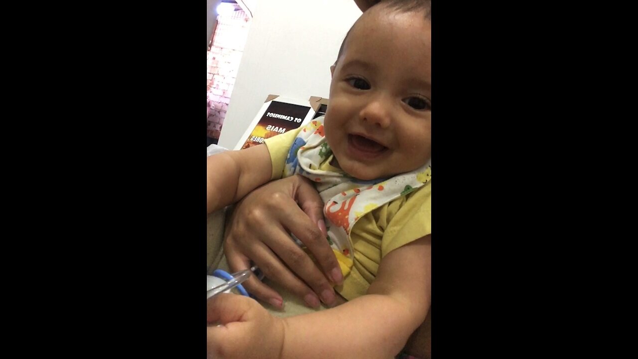 Cute Baby Chatting on Cell Phone