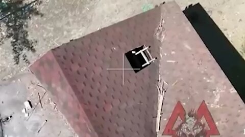 Russian drone drops grenade through house roof window