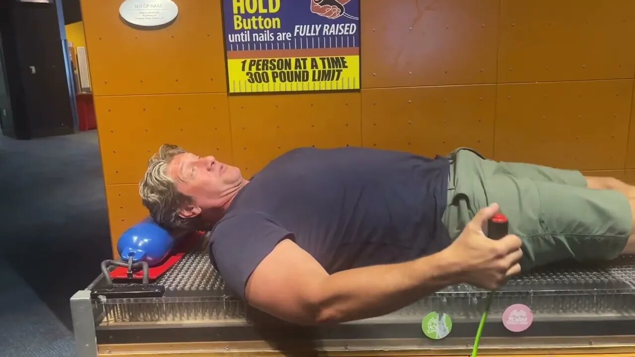 Laying on a BED OF NAILS