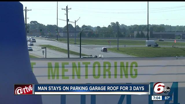 Man stays on top of parking garage for three days
