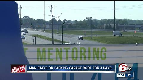 Man stays on top of parking garage for three days