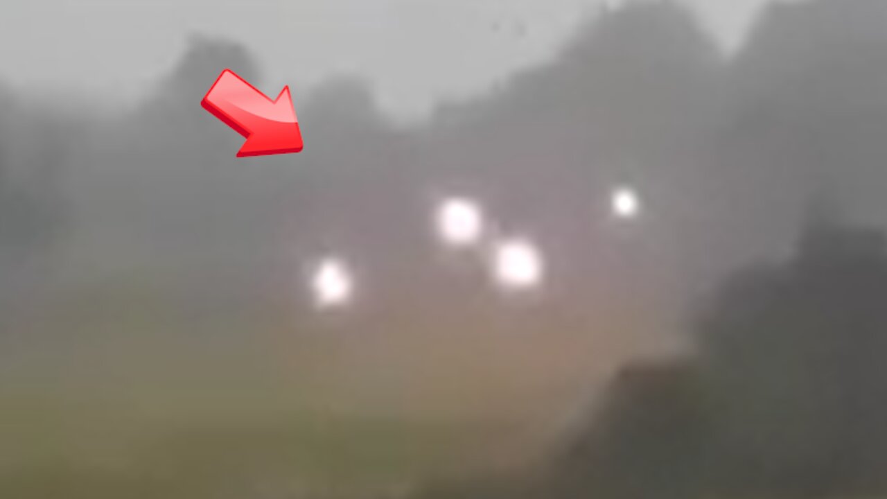 Multiple light balls gathered and floating in a grassy field [Space]