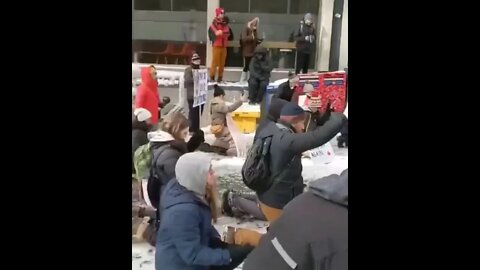 Canadian Truckers praying on their knees