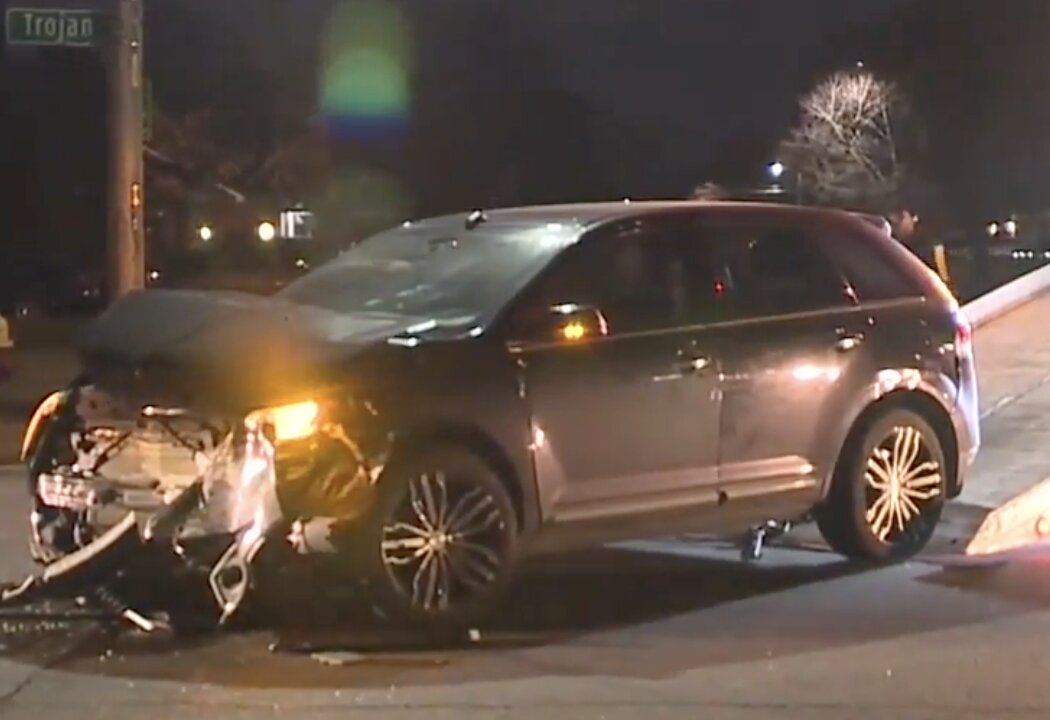 DPD officer involved in crash after running stop sign with no lights & sirens