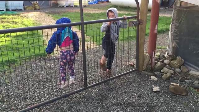 Little Girl Got Stuck Hanging From A Fence