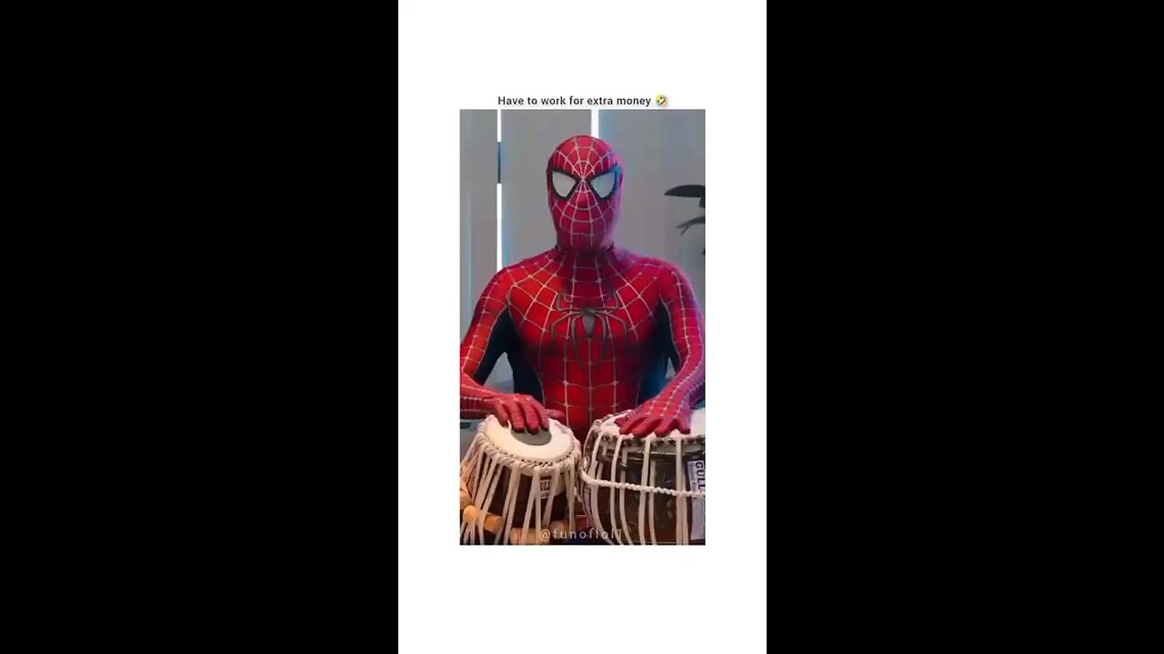 Spider man playing tabla